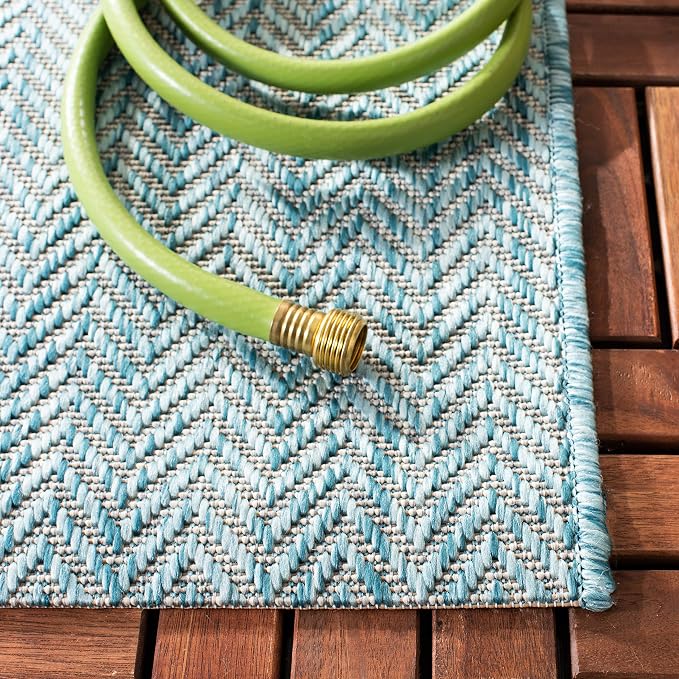SAFAVIEH Outdoor Area Rug 6'7"x9'6" - Image 5