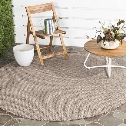 SAFAVIEH Outdoor Round Rug 4' by Unknown