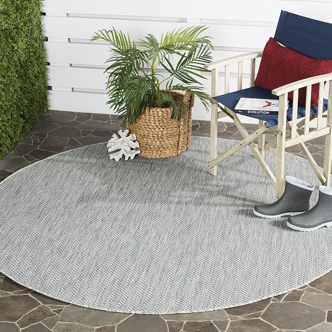 SAFAVIEH Outdoor Round Rug 6'7" by Unknown