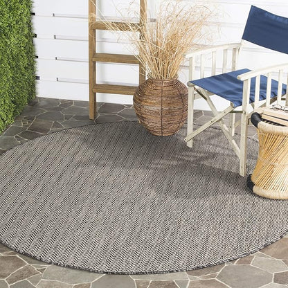 SAFAVIEH Outdoor Round Rug 10' by Unknown