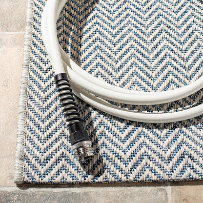 SAFAVIEH Outdoor Area Rug 10x14 - Image 3