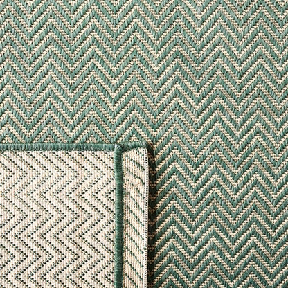 SAFAVIEH Outdoor Area Rug 6'7"x9'6" - Image 5